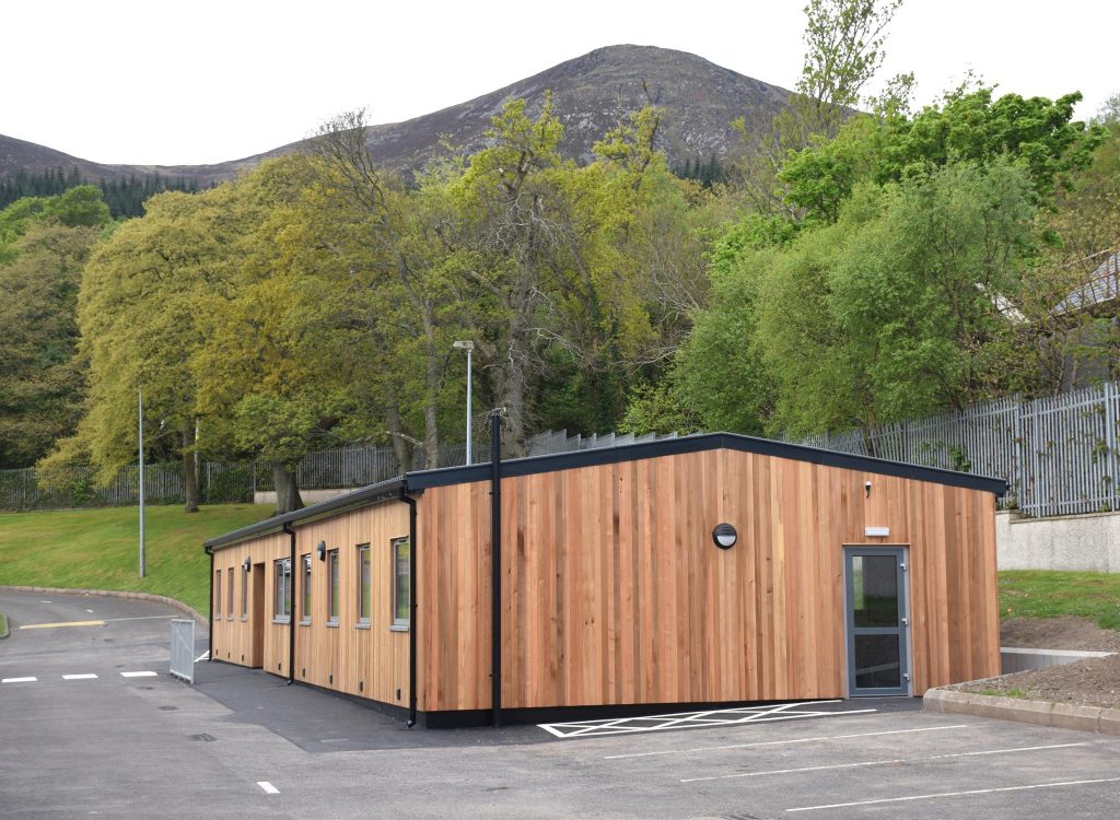 The Croí building at the back of Shimna with the Mournes in the background