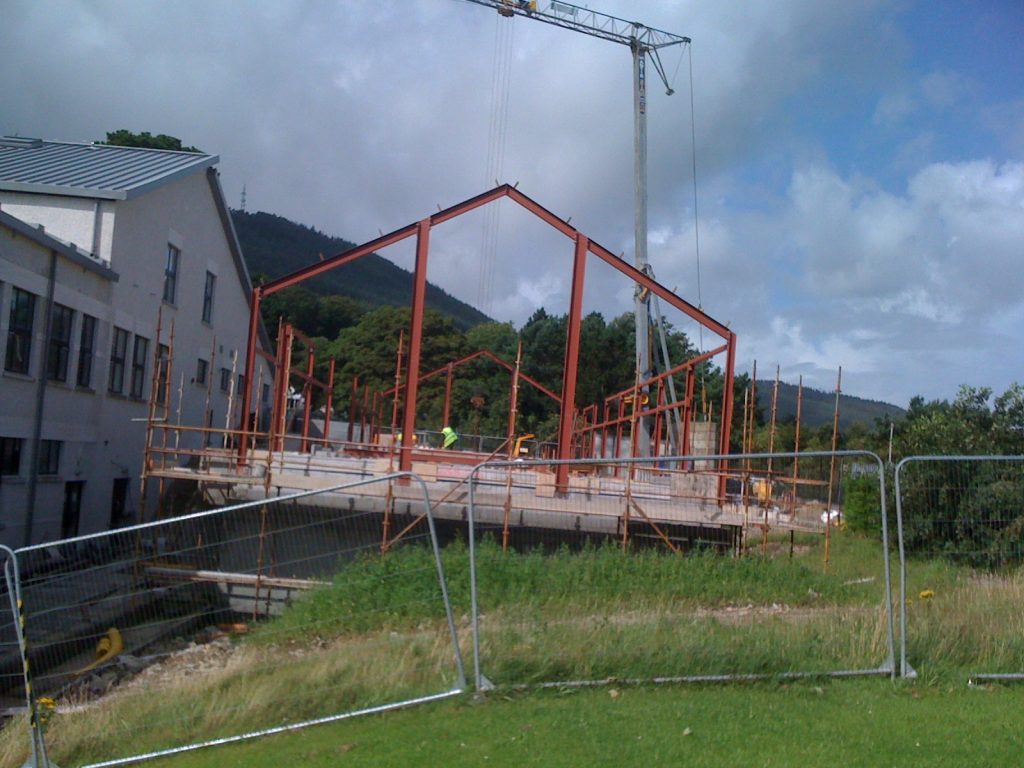 The frame of the new building going up
